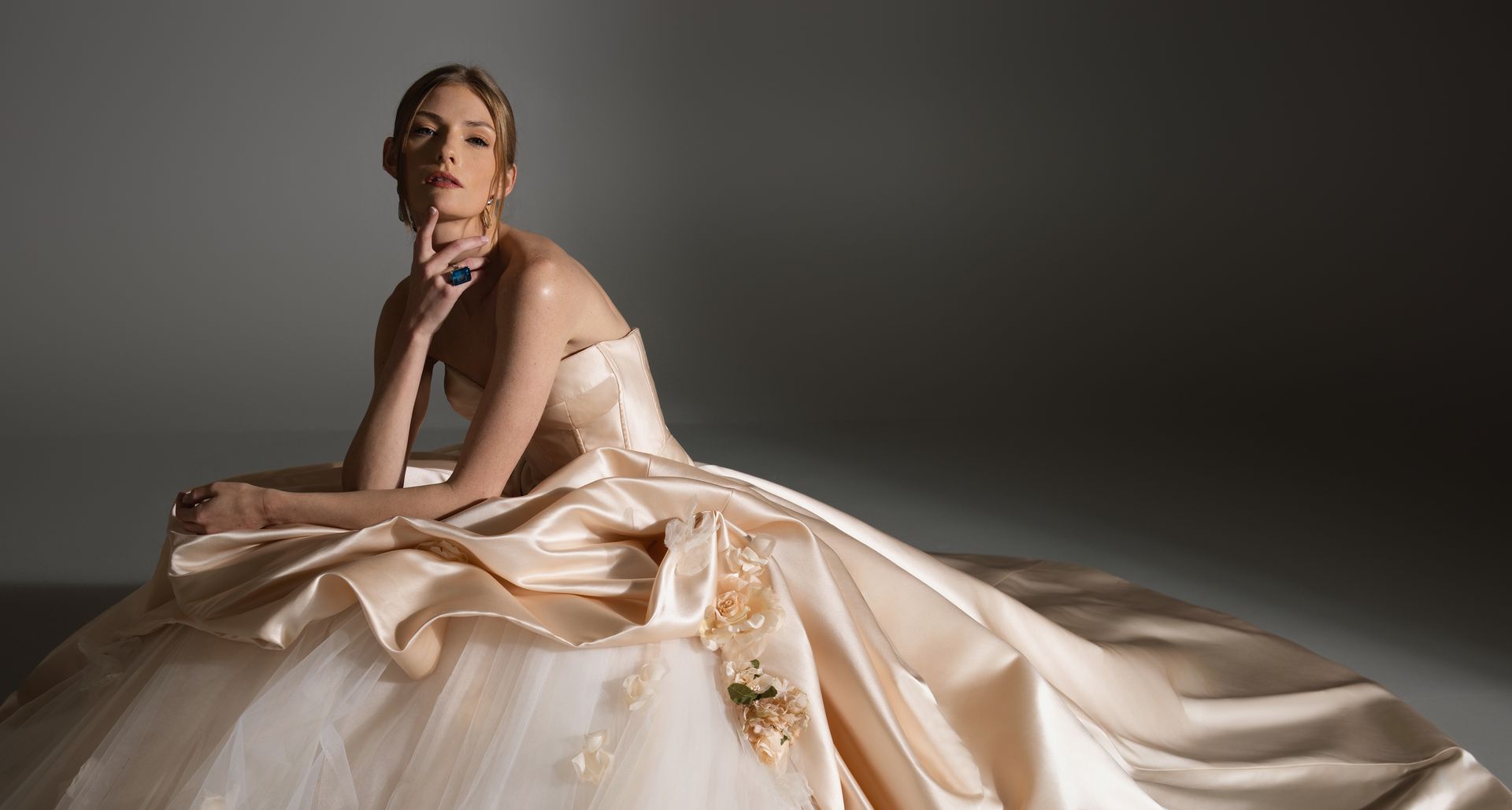 Bride in elegant white wedding gown showcasing luxury bridal fashion by Lazaro Perez