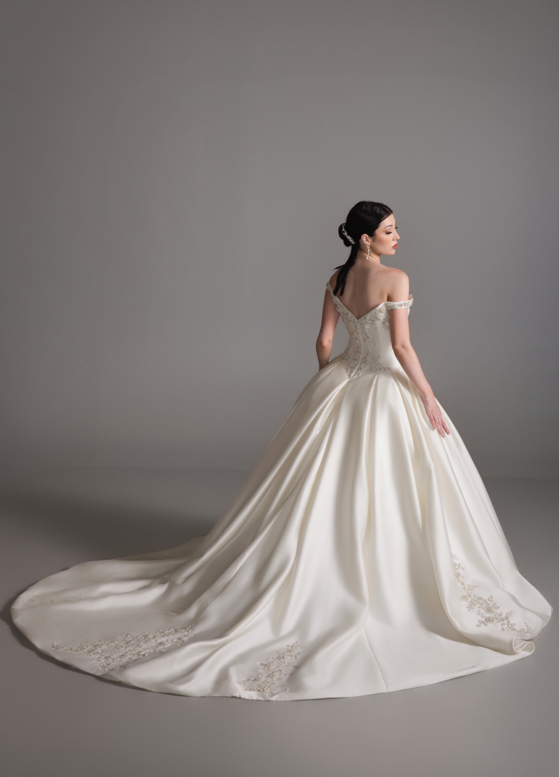 BRONTE bridal gown back view showcasing chapel train and off-shoulder neckline