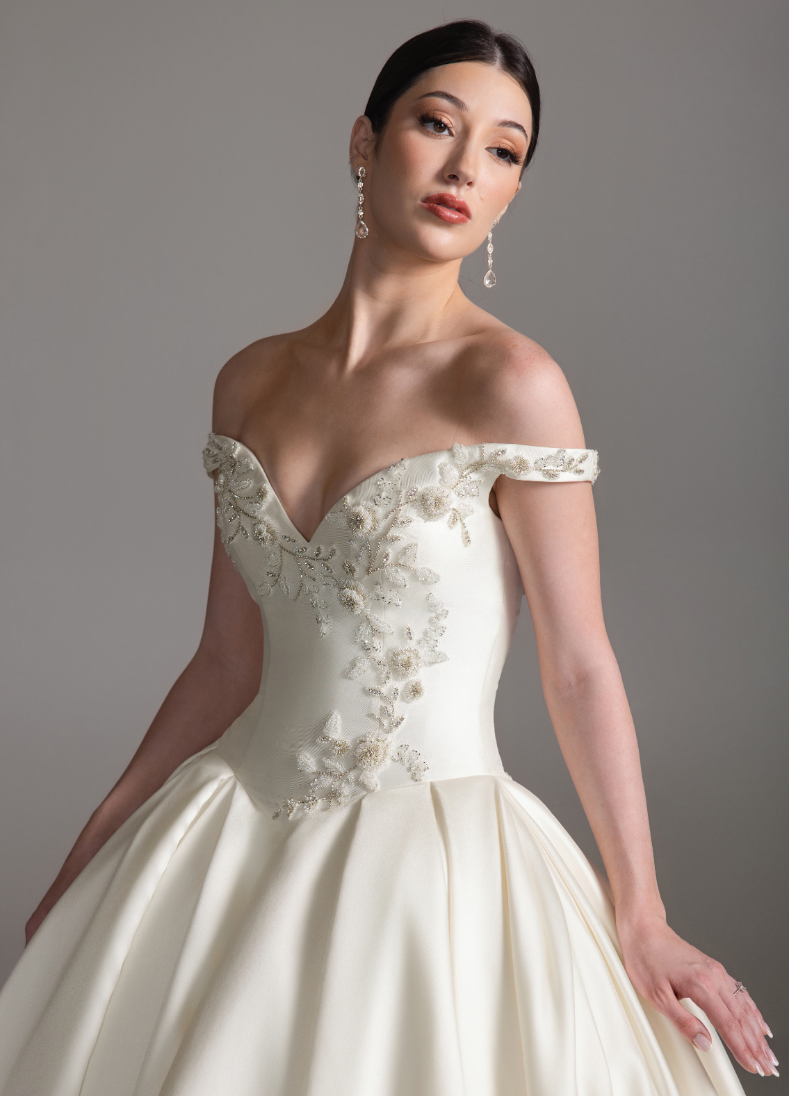 BRONTE wedding dress detail highlighting floral beaded applique