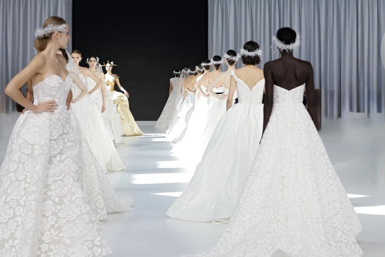 Lazaro bridal runway finale with models in couture wedding gowns