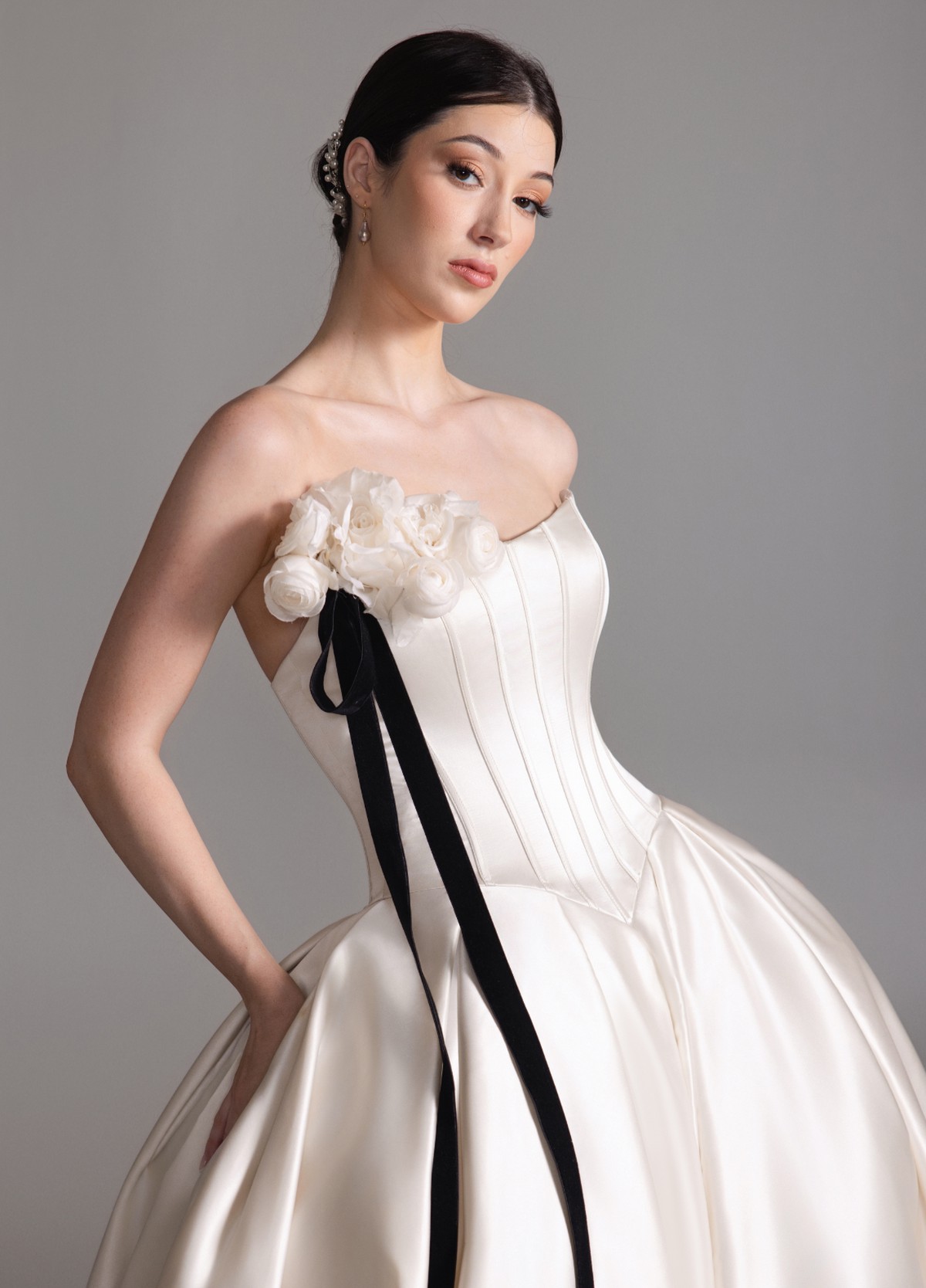 BEHATI wedding gown detail highlighting curved neckline