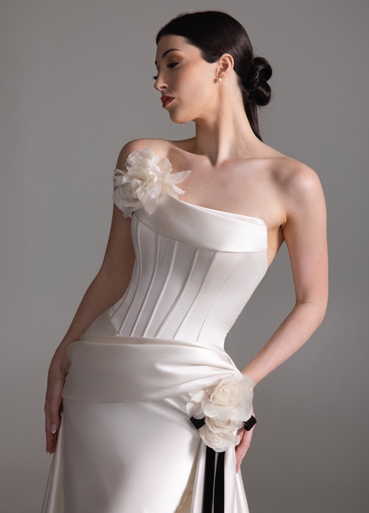 BETHANY wedding gown detail highlighting draped neckline and lace-up corset