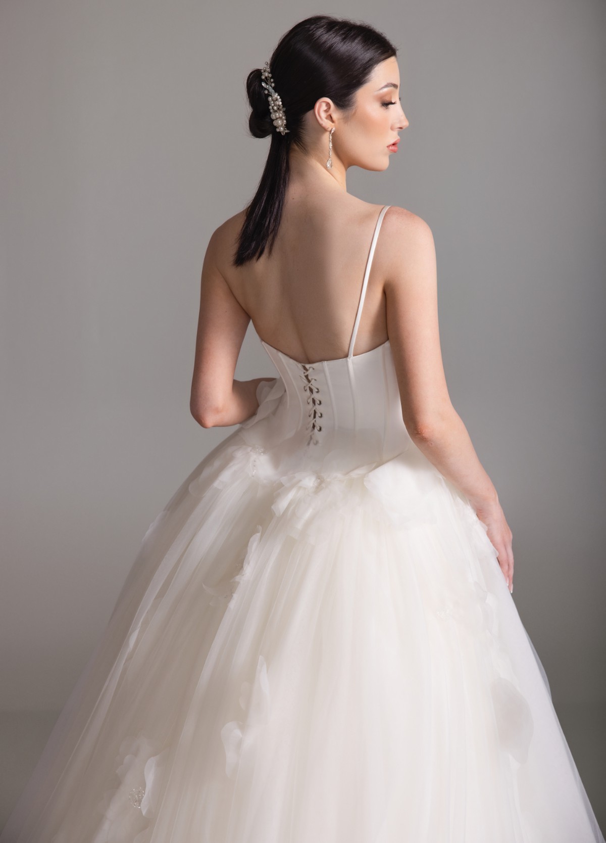 BRITTANY dress featuring curved neckline with floral crystal accents