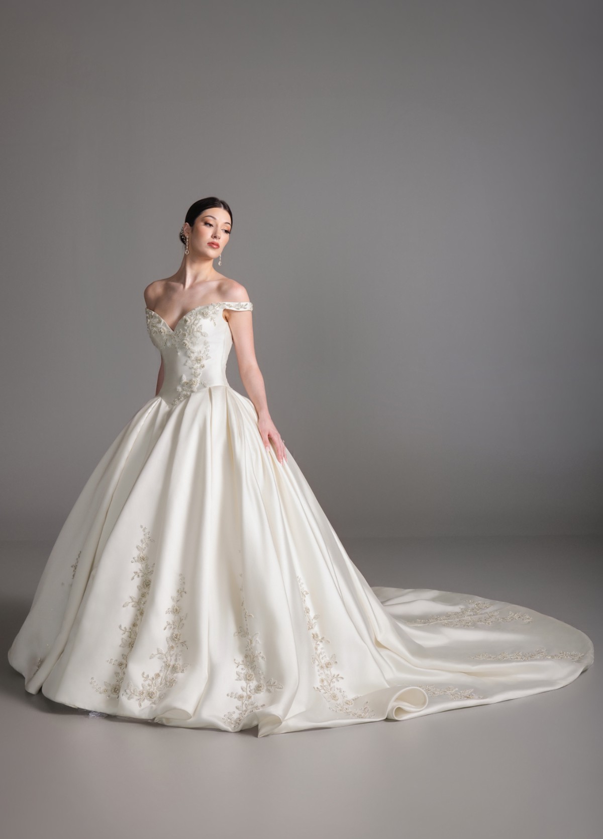 BRONTE ivory Mikado ball gown with sculpted basque waist and box-pleated skirt