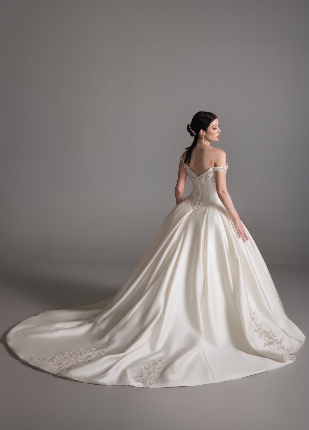 BRONTE bridal gown back view showcasing chapel train and off-shoulder neckline