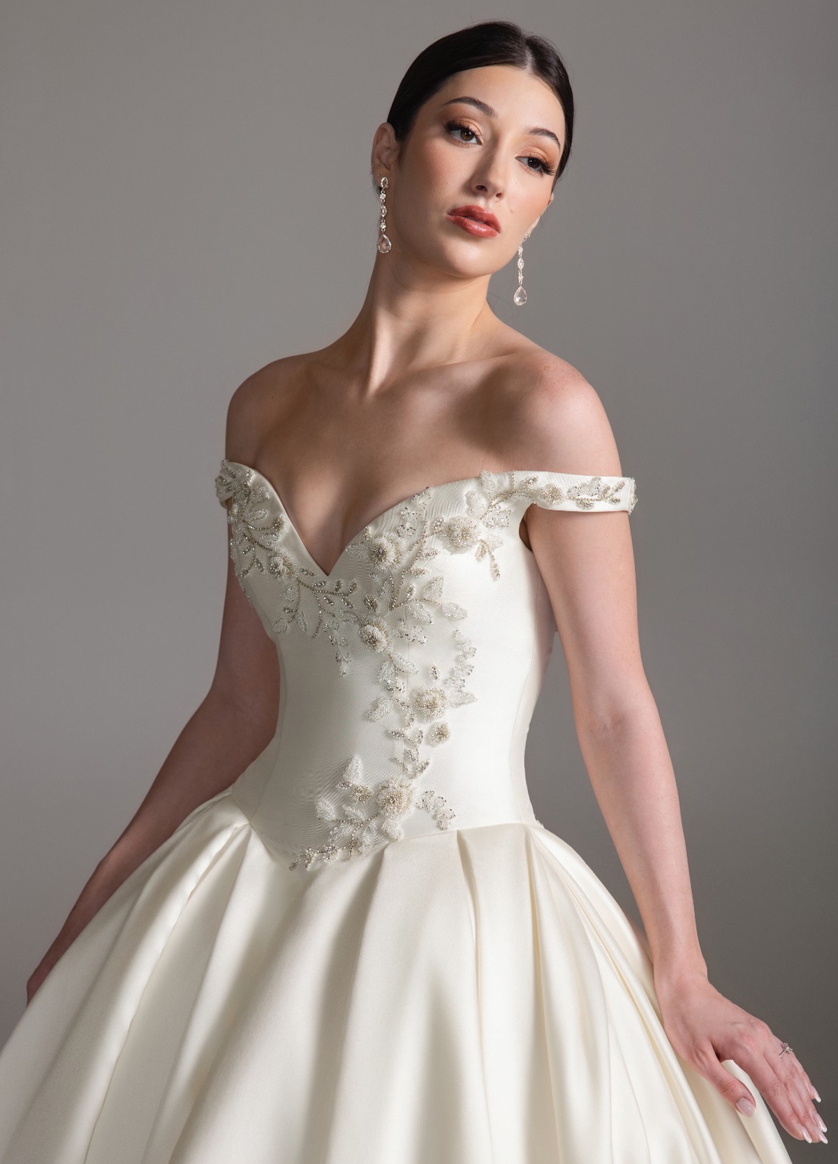 BRONTE wedding dress detail highlighting floral beaded applique