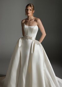 ALICIA wedding gown featuring structured corset bodice with curved neckline detail