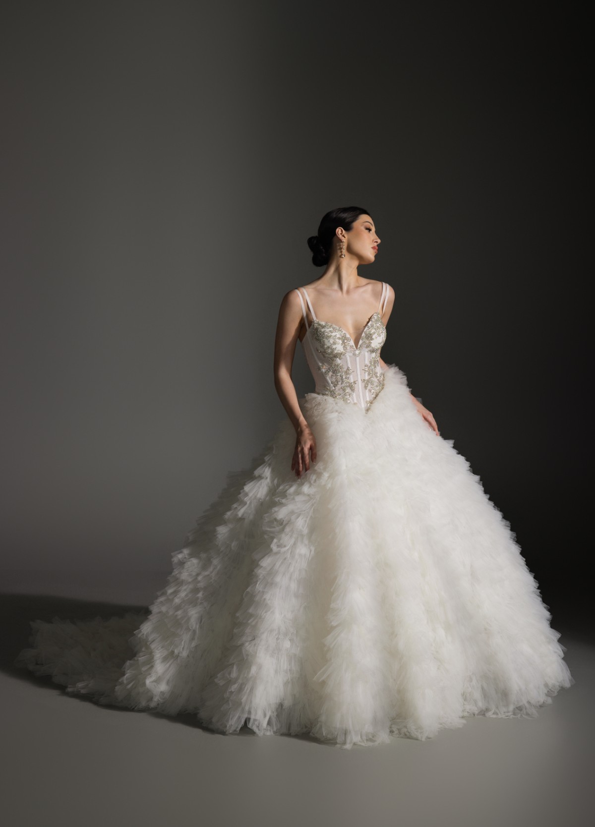 ANYA ivory ball gown in textured tulle with sculpted basque waist and tufted skirt