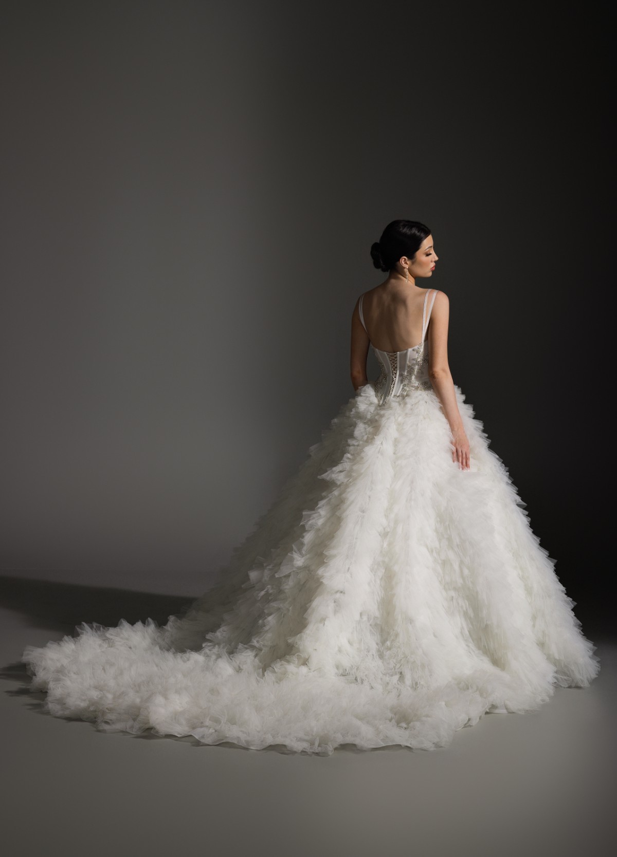 ANYA bridal dress back view showcasing voluminous skirt flowing into chapel train