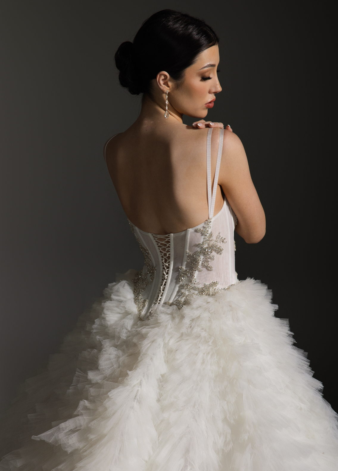 ANYA gown detail highlighting beaded appliqué and romantic architectural focal point