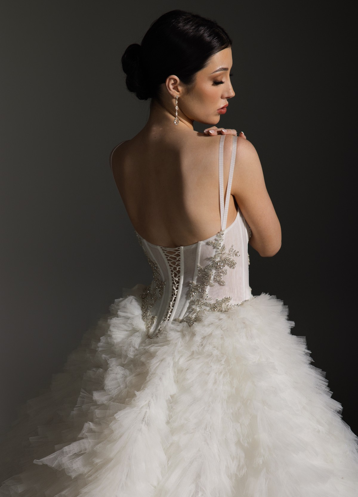 ANYA gown detail highlighting beaded appliqué and romantic architectural focal point