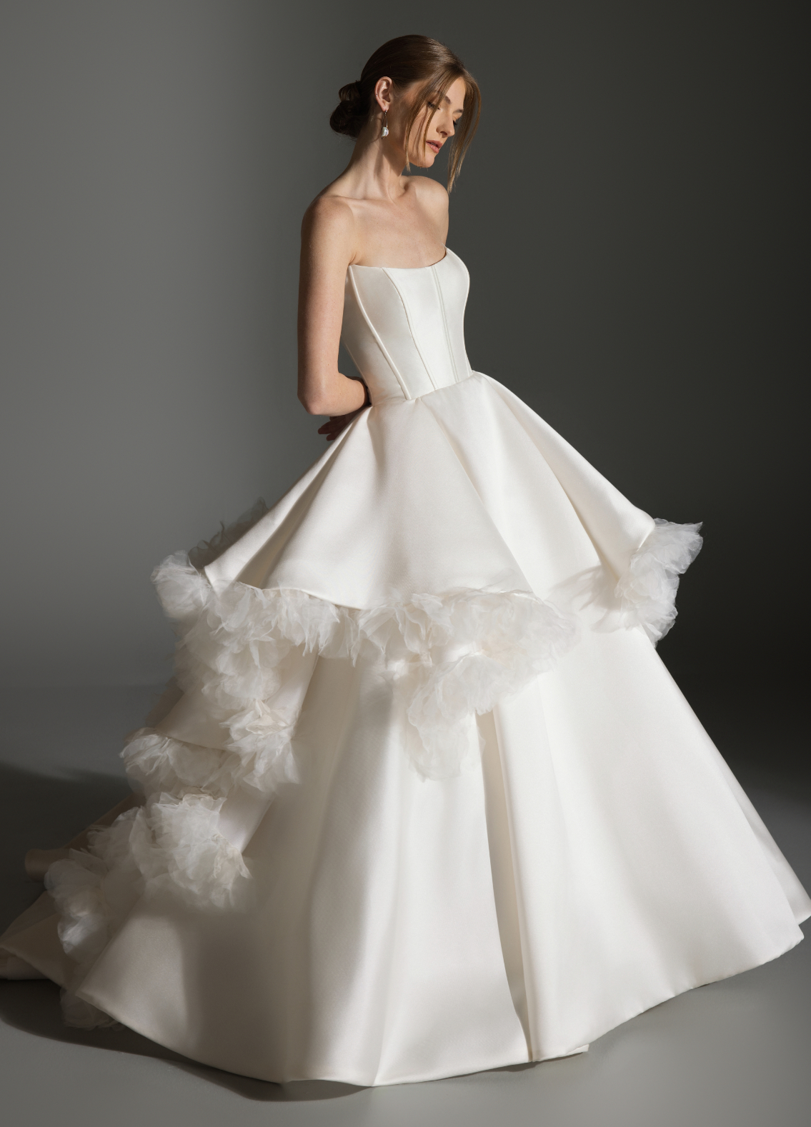 APRIL gown detail of curved neckline with organza petal floral accents and texture