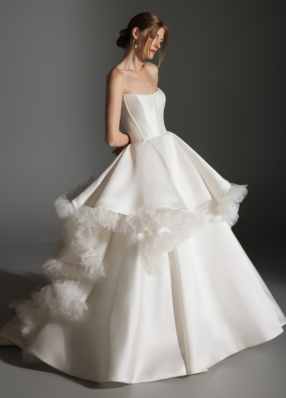 APRIL gown detail of curved neckline with organza petal floral accents and texture