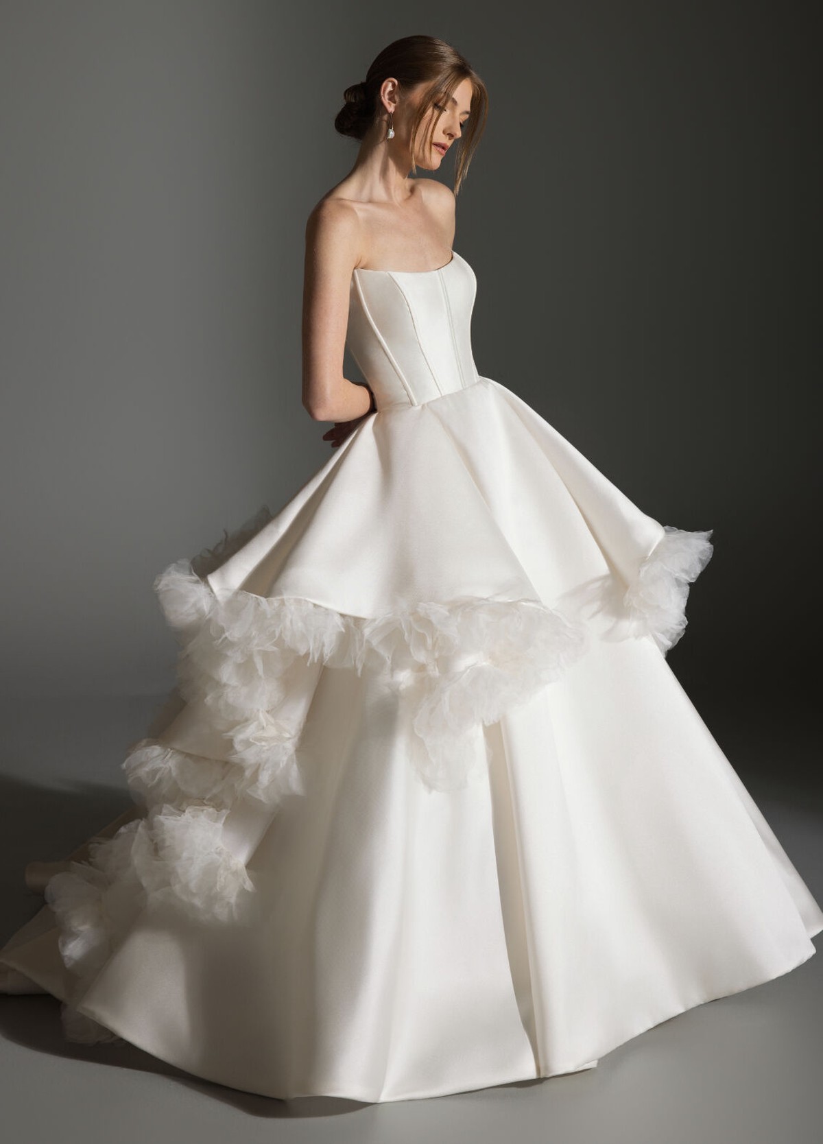 APRIL gown detail of curved neckline with organza petal floral accents and texture