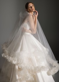 APRIL couture dress highlighting romantic artistic design and graceful movement