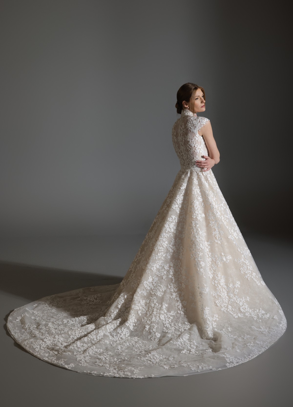 ASHLEY bridal dress back view with full circular skirt and chapel train grace