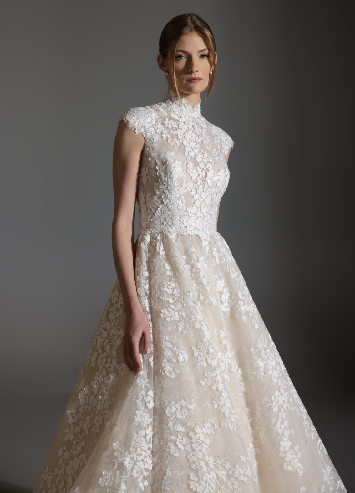 ASHLEY wedding gown featuring mandarin neckline with cap sleeves and soft structure