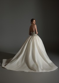 ASPEN bridal gown back view with gathered skirt flowing into chapel train elegance
