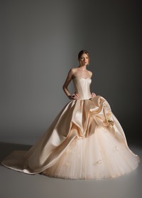 ASTOR dress detail highlighting floral corsage accents and romantic focal point