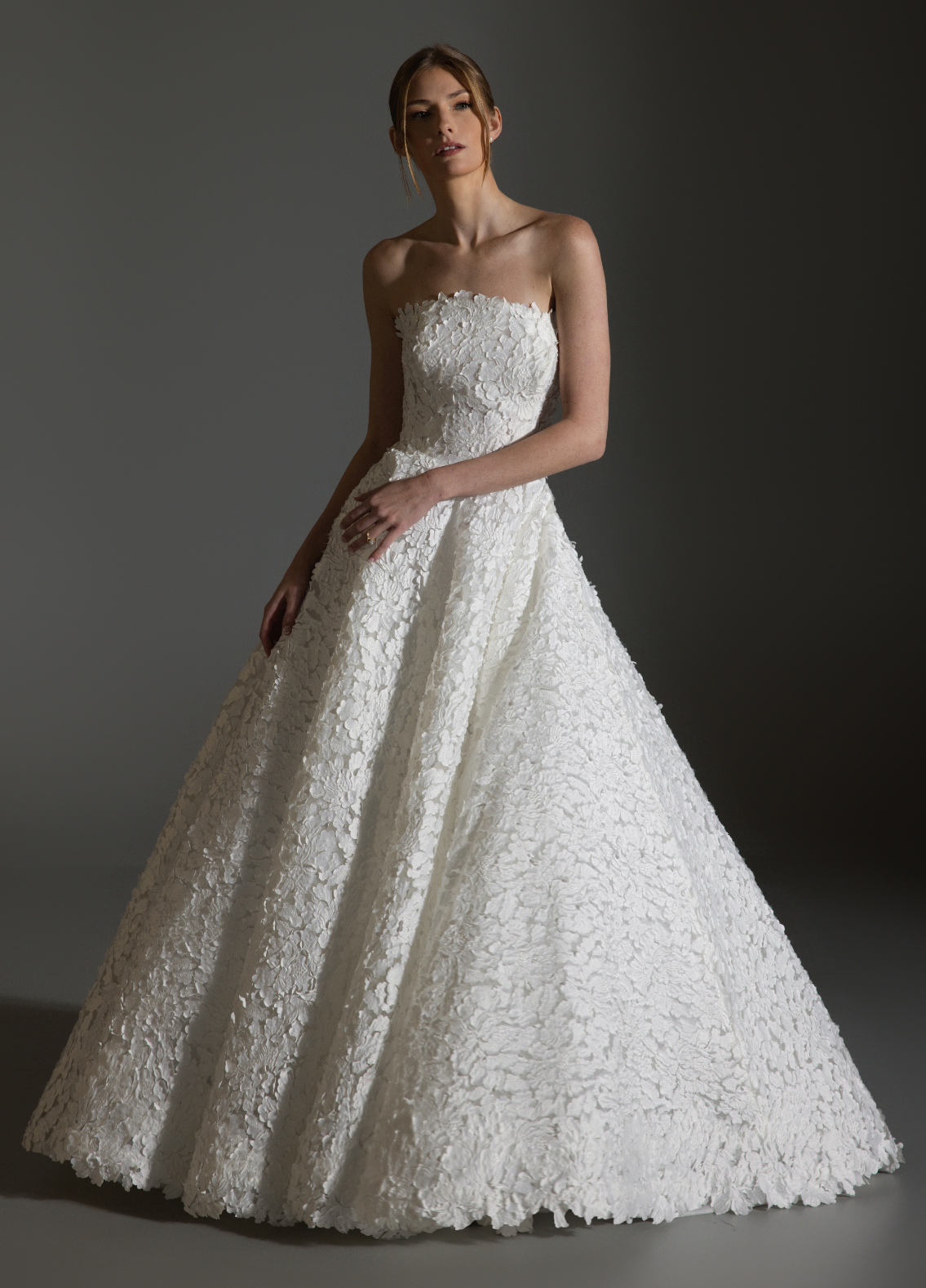 AVERY dress detail of black velvet bow belt creating striking couture contrast