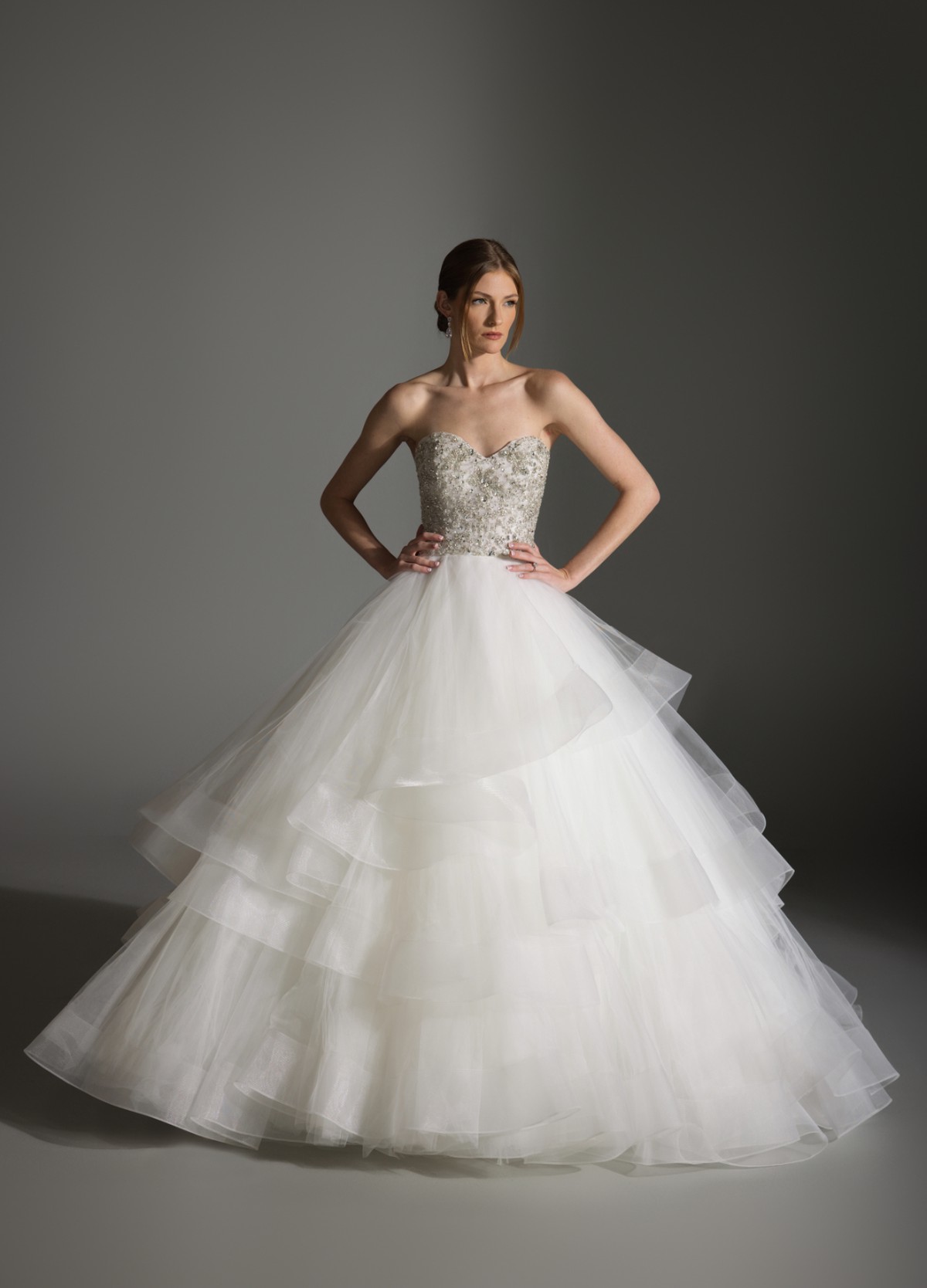 AVRIL ivory tulle ball gown with crystal-beaded bodice and tiered waterfall skirt