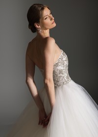 AVRIL wedding gown featuring classic sweetheart neckline with luminous sparkle