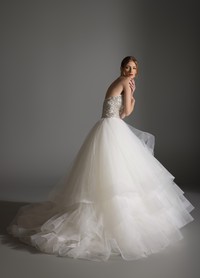 AVRIL dress highlighting ethereal romantic quality and architectural volume