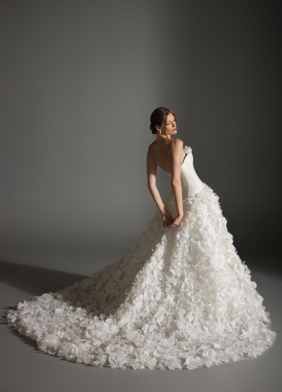 AZALEA bridal dress back view showcasing textured skirt and chapel train flow